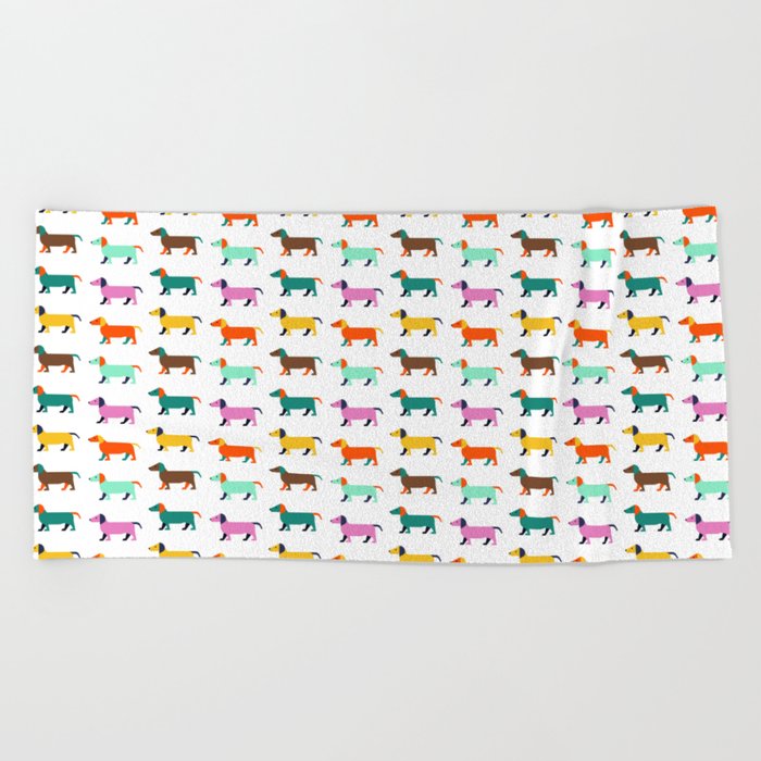 Colorful puppies Beach Towel