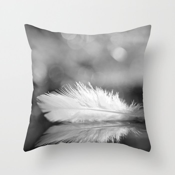 White Feather In Black And White Bokeh Background #decor #society6 #buyart Throw Pillow