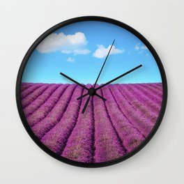 Lavender flowers field and surreal clouds. Provence Wall Clock
