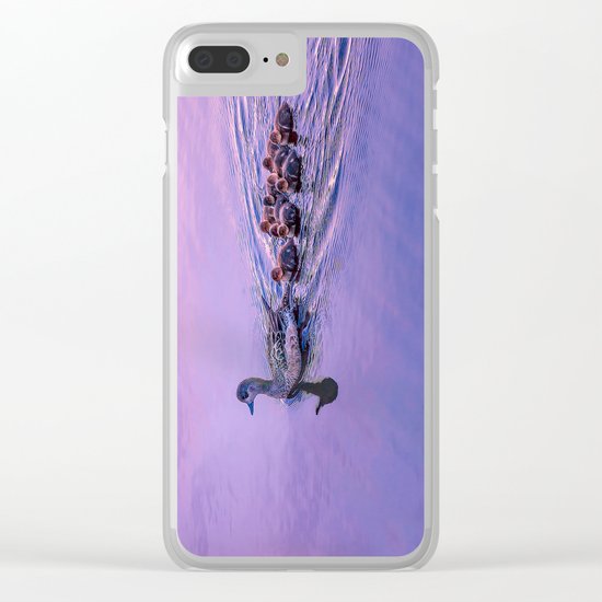 Ducklings floating at sunset Clear iPhone Case
