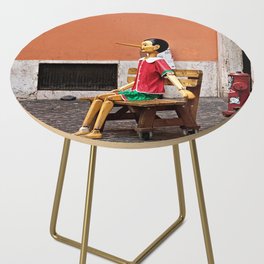Pinocchio Marionette Sitting on Street Bench Side Table