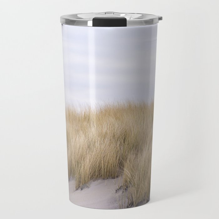 Field of grass growing in the sand Travel Mug