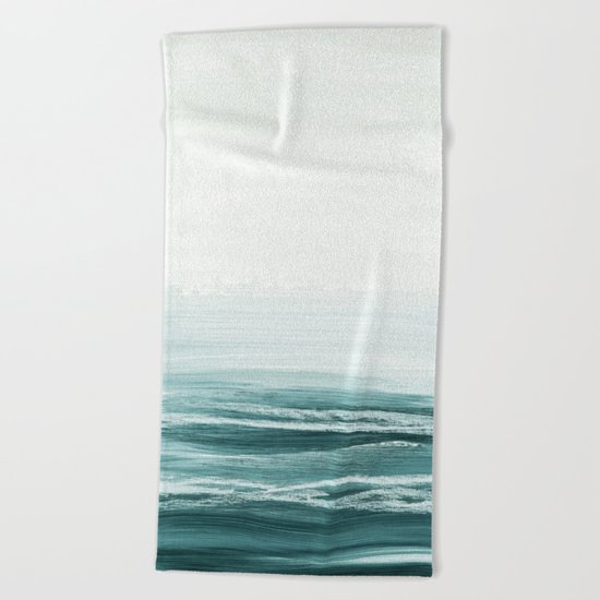 hazy emerald sea Beach Towel