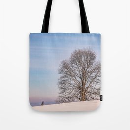 The lonely tree on a winter day Tote Bag