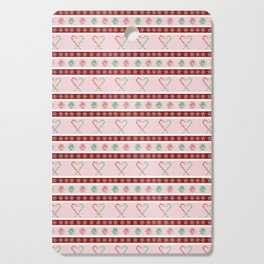 Winter Peppermint stripes on pink and red Cutting Board