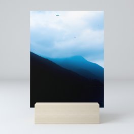 Paragliders in the clouds Mini Art Print