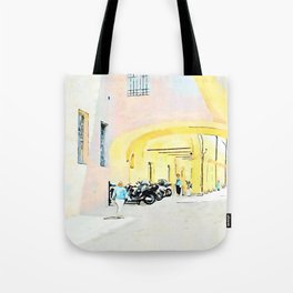 Faenza: glimpse of alley with arcades and woman Tote Bag