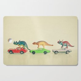 Dinosaurs Ride Cars Cutting Board