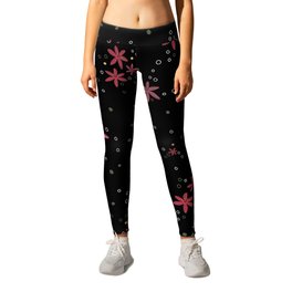 Pink flowers and dots pattern on black background Leggings