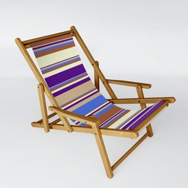 [ Thumbnail: Eyecatching Tan, Royal Blue, Sienna, Light Yellow, and Indigo Colored Lines Pattern Sling Chair ]