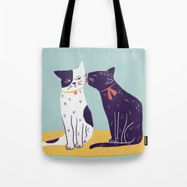 two cats licking Tote Bag