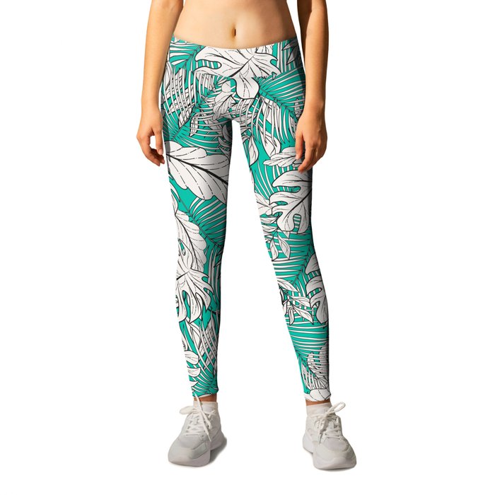 Drawing of tropical plants on turquoise Leggings