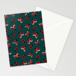 Seamless pattern with the image of flying and crawling ladybugs on a green background for printing on fabric and other surfaces Stationery Card