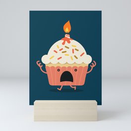 Cupcake on fire Mini Art Print