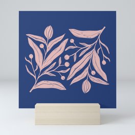 Pink floral motif on indigo blue Mini Art Print