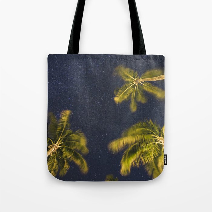 Palm trees at night against starry sky Tote Bag