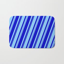 [ Thumbnail: Blue and Light Sky Blue Colored Lined/Striped Pattern Bath Mat ]