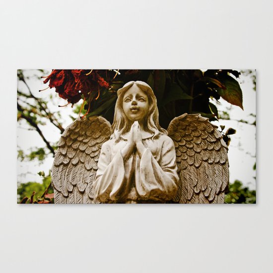 The angel prays Canvas Print