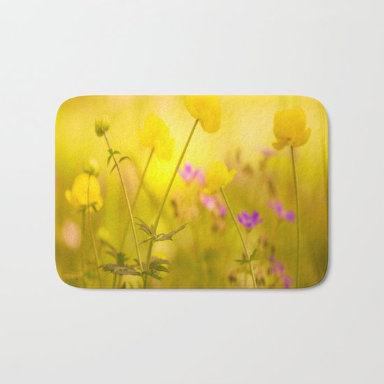 Wild flowers in the golden sunset shades Bath Mat