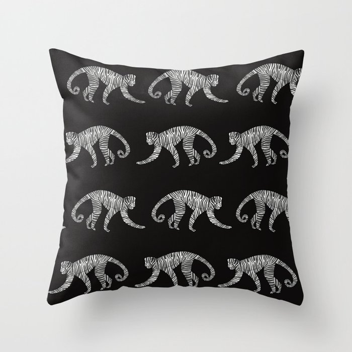 Zebra-print monkeys on black background Throw Pillow