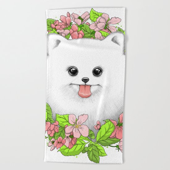 Pomeranian in flowers Beach Towel