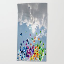 Butterflies in blue sky Beach Towel