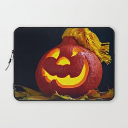 Glowing Pumpkin with Autumn Leaves on a Dark Background. Jack's Lantern. Halloween Decoration Laptop Sleeve