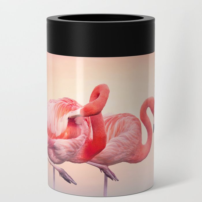 Two Pink flamingos in the water at sunset Can Cooler