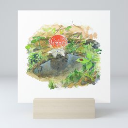 A little mushroom and a puddle Mini Art Print