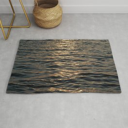 Surface of sea in twilight Rug