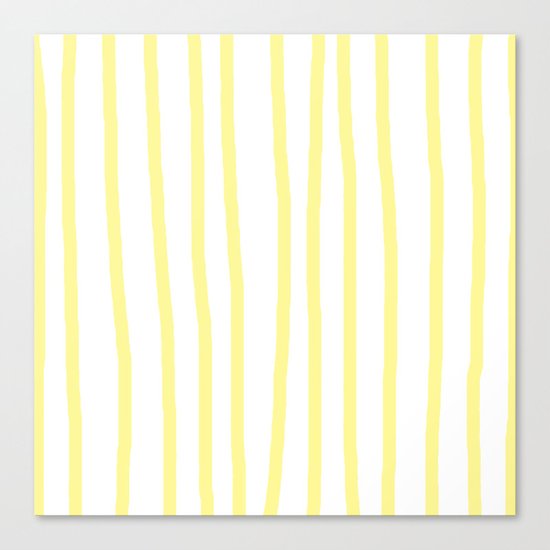 Simply Drawn Vertical Stripes in Pastel Yellow Canvas Print