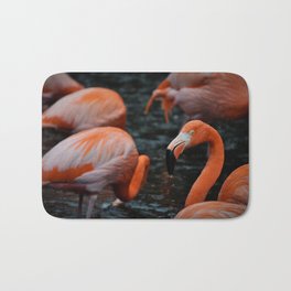 Flamingos in the rain Bath Mat