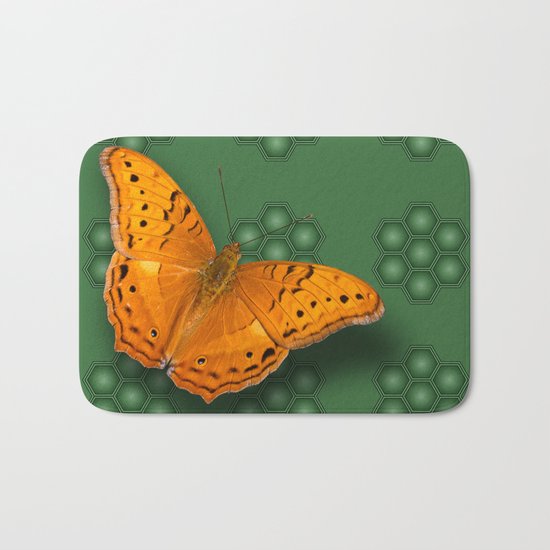 Beautiful orange butterfly on green pattern background Bath Mat