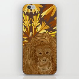 Orangutan in the jungle sitting on a brown abstract leafy pattern background iPhone Skin