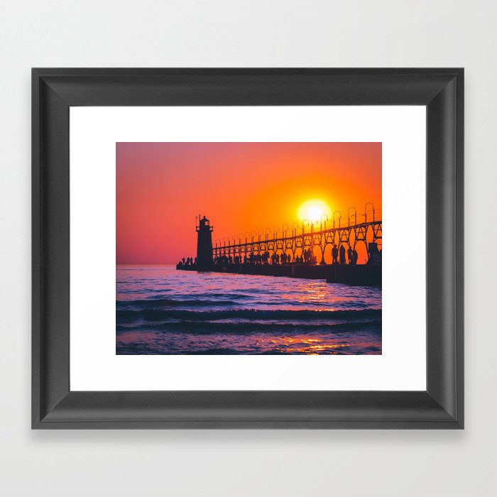 South Haven Michigan's Lighthouse at sunset on Lake Michigan Framed Art Print