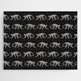 Zebra-print monkeys on black background Jigsaw Puzzle