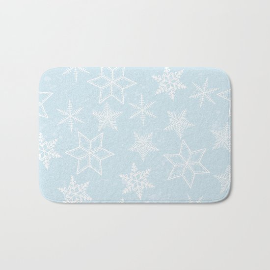 Snowflakes on light blue background Bath Mat