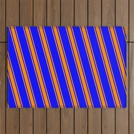 [ Thumbnail: Blue and Dark Orange Colored Lined/Striped Pattern Outdoor Rug ]