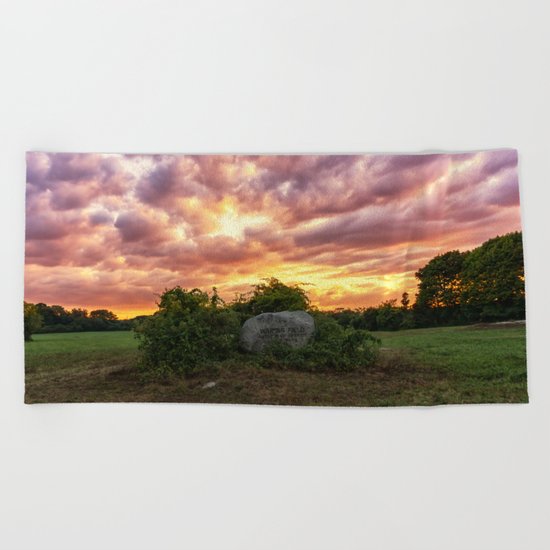 Waring field at sunset Beach Towel
