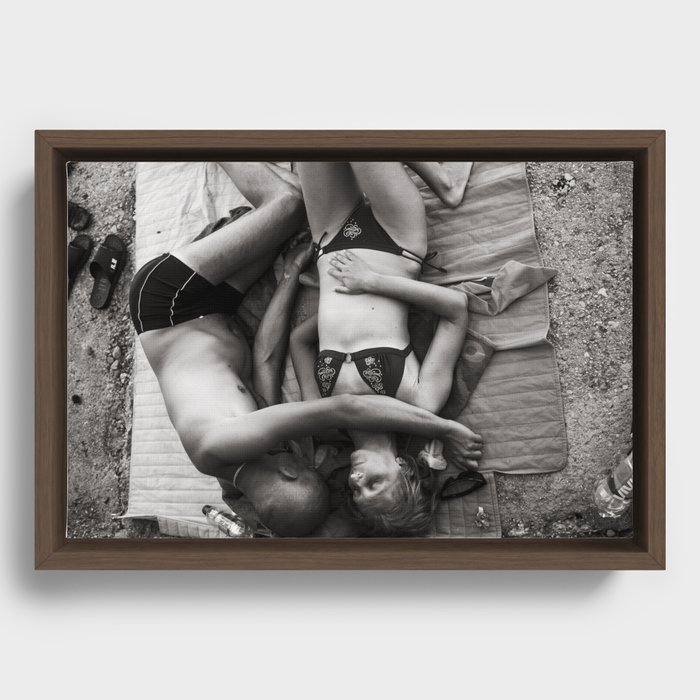 Lovers on the beach Framed Canvas