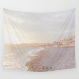 Nice (France) shoreline at sunset Wall Tapestry