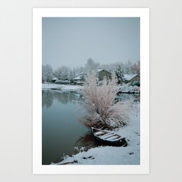 Canoe on a snowy lake in Colorado Art Print