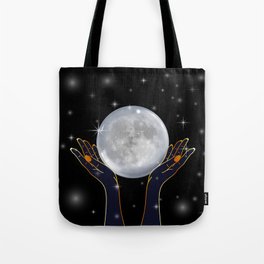 Womans hands holding the moon on a starry night Tote Bag