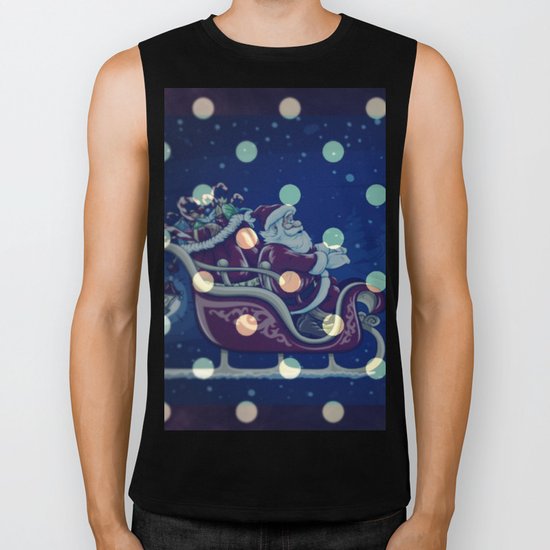 Santa Claus riding his sleigh on a snowy blue Christmas Eve Biker Tank