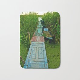 Boat dock through the bulrush made of recycled colorful old doors color photograph / photograph portrait Bath Mat