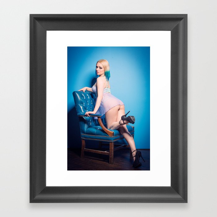 Blu on blue leather chair Framed Art Print