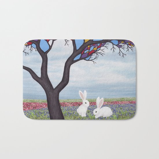 bunnies and the stained glass tree Bath Mat