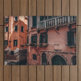 Old pink house facade in Venice Italy with colorful windows flowers Outdoor Rug