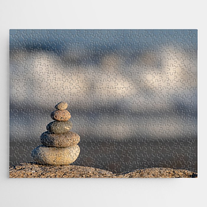 Pebbles stacked on the beach Jigsaw Puzzle