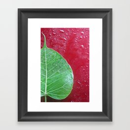 Leaf on red Framed Art Print